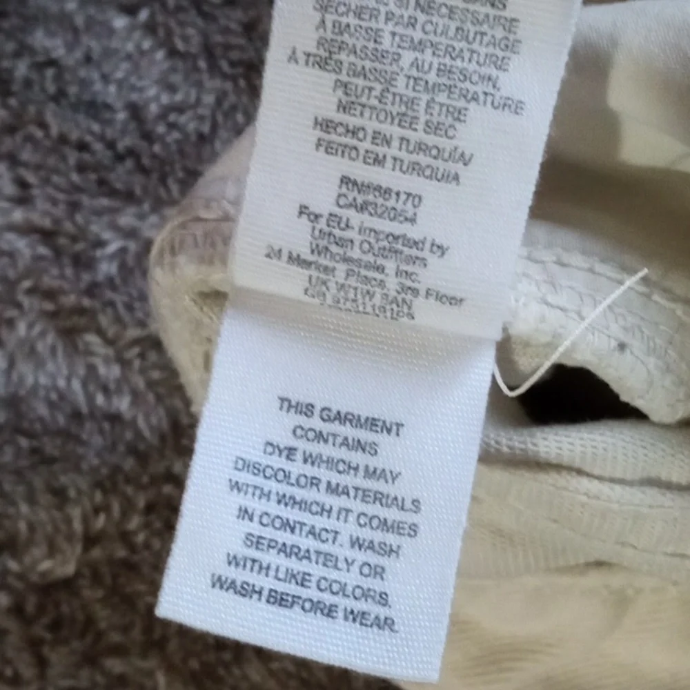 We the Free 27 waist cream colored five pocket distressed miniskirt